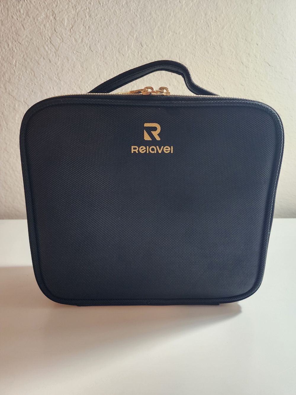 Reiavel Women's Black Toiletry Bag with Gold Accents